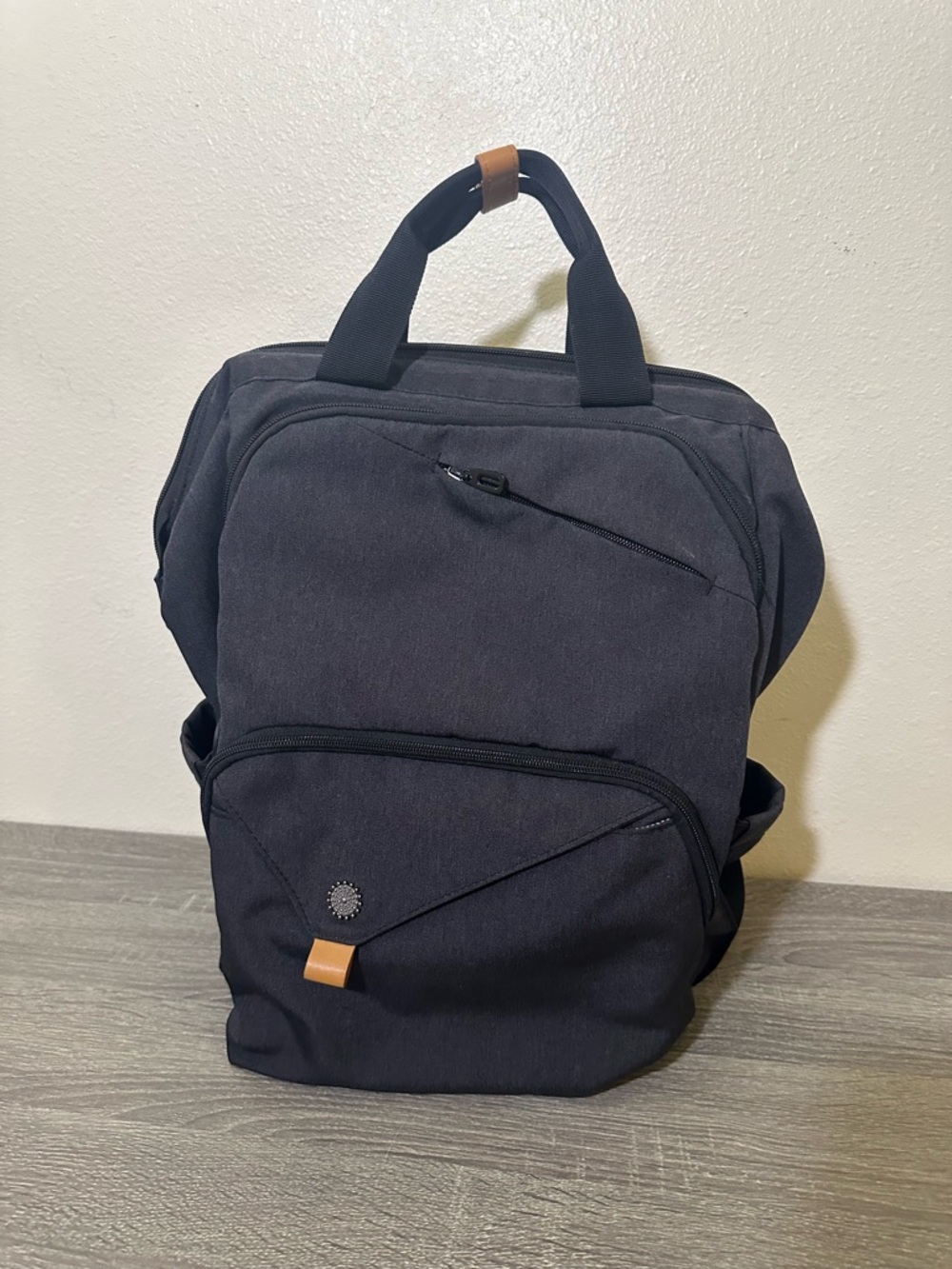 Black laptop. Backpack  with packets Minimal Urban Carry